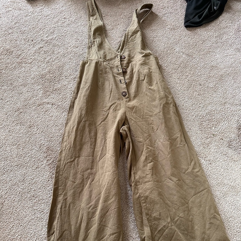 Linen jumpsuit- worn very little. Good condition and very cute